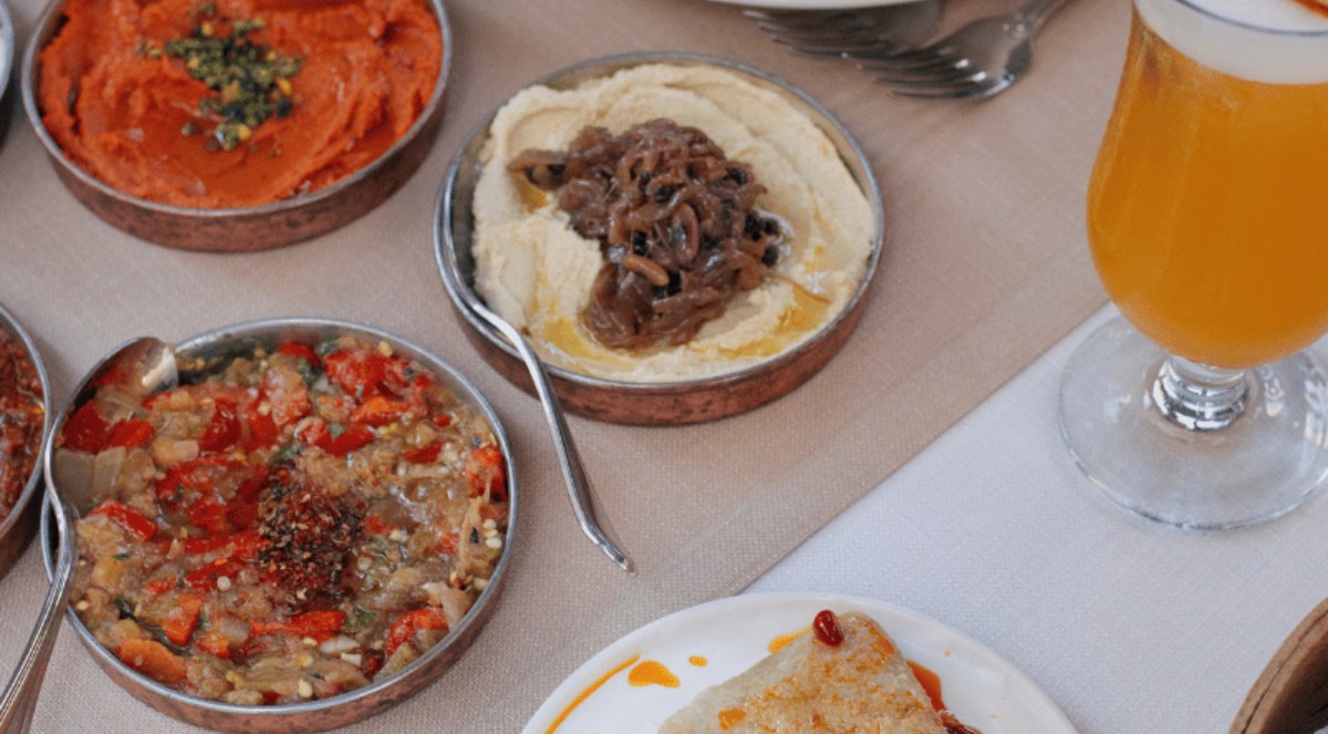 Nuz Restaurant - muhammara and topik mezes served in copper bowls