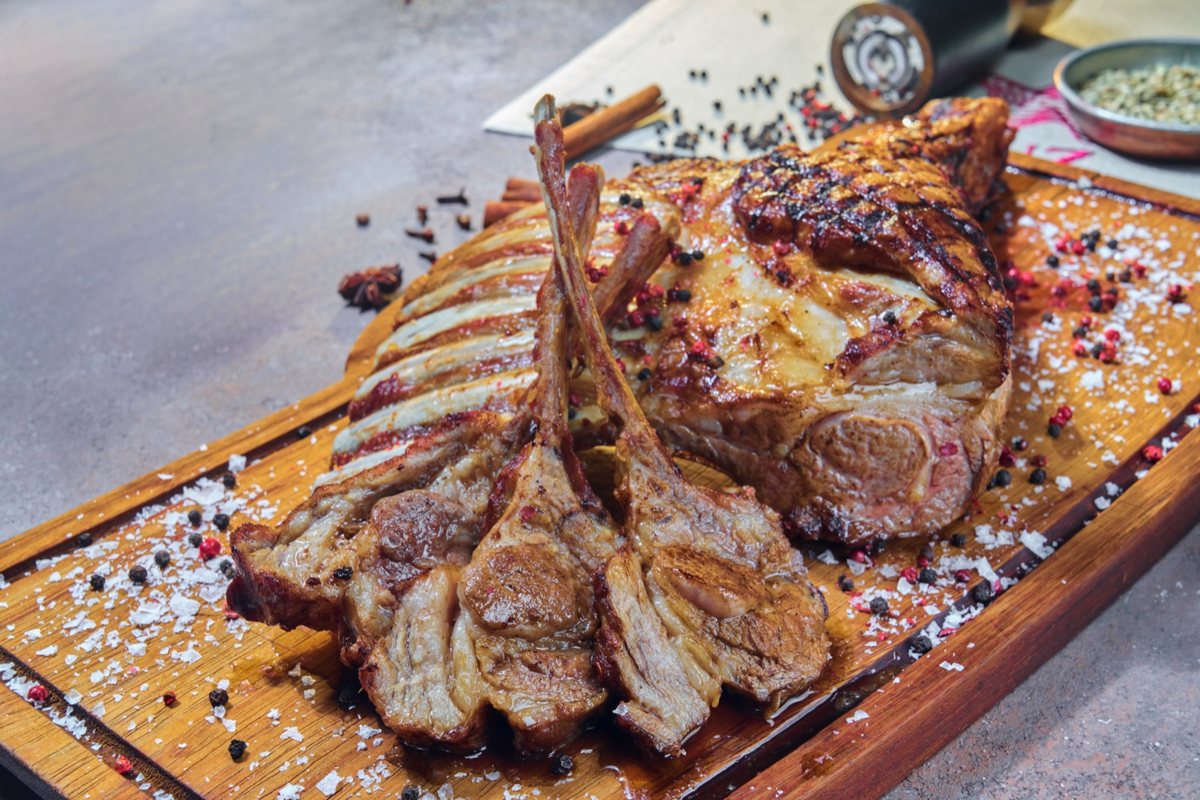 Nuz Restaurant - lamb rack served on a wooden board